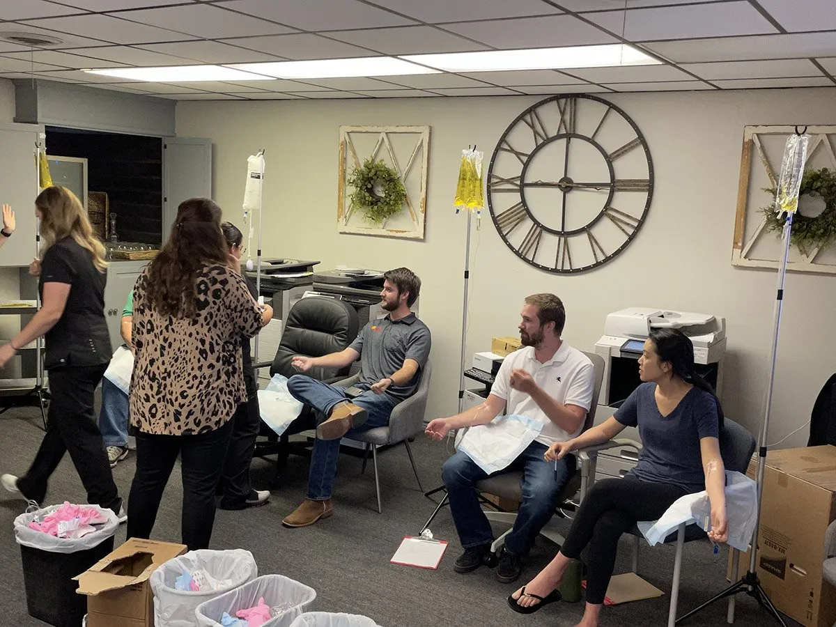 People receiving mobile IV therapy in Kingston