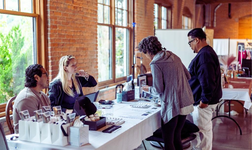 Drip Lounge team hosting a corporate wellness partnership event at a workplace